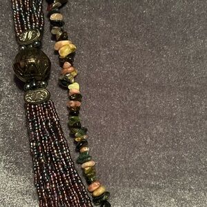 2 necklaces, purple & grey, one beaded, one stone chips